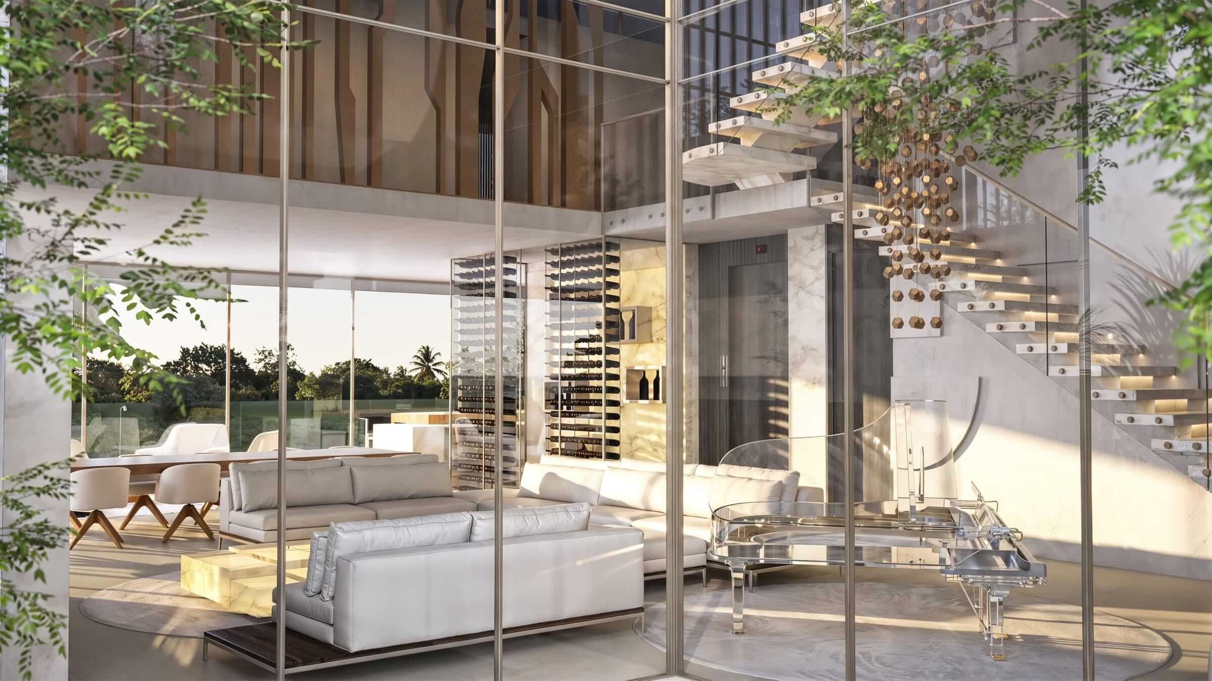 The living room seen from the garden, its suspended staircase and vertical cellar behind the plane of glass.